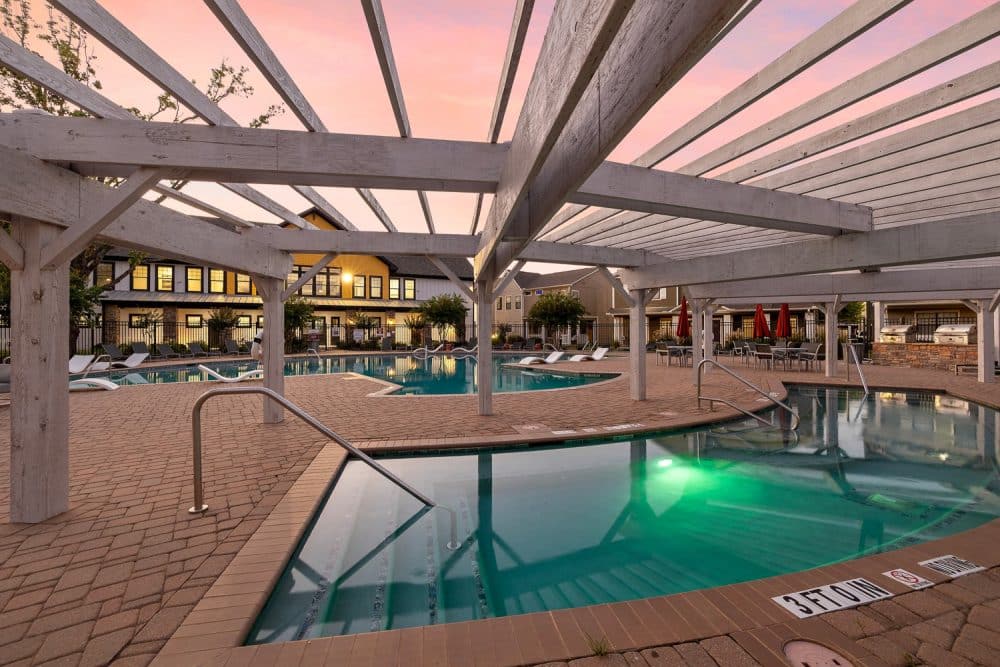 the collective at norman apartments near the university of oklahoma hot tub sunset
