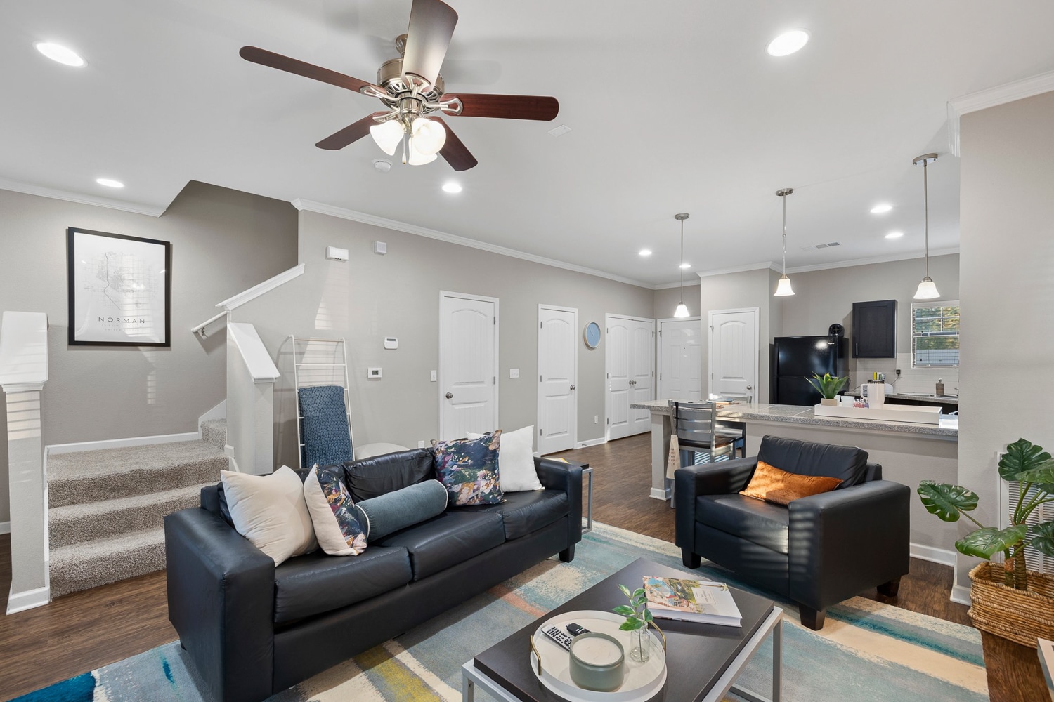 the collective at norman apartments near the university of oklahoma living room second floor stairs