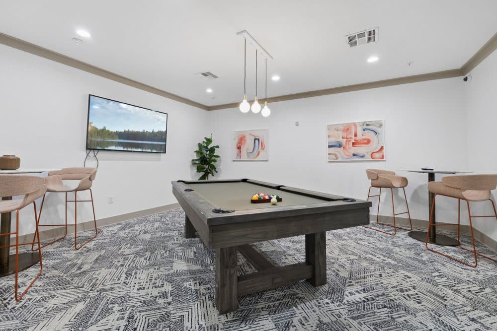 the collective at norman apartments near the university of oklahoma resident clubhouse game room billiard table