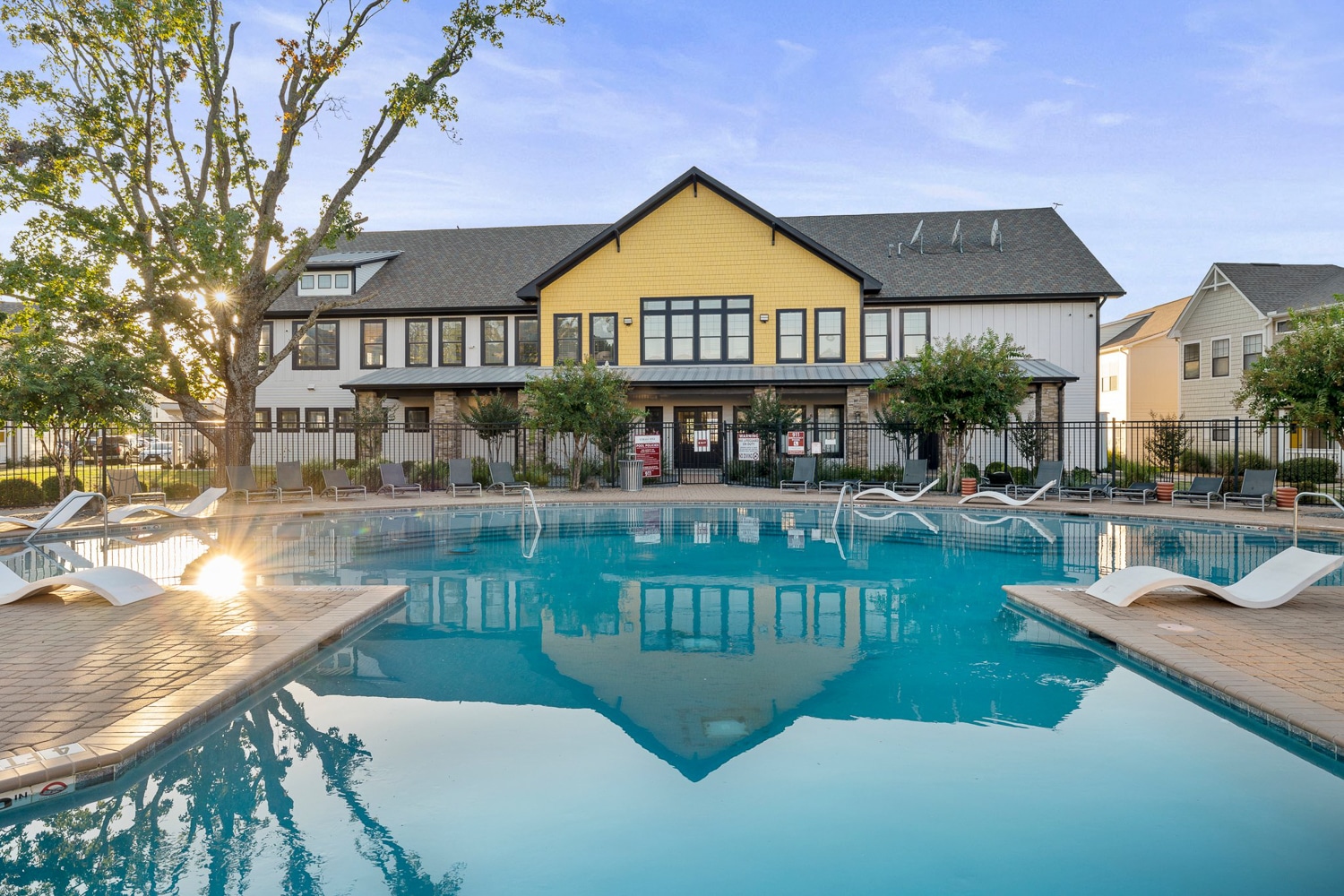 the collective at norman apartments near the university of oklahoma resort style pool clubhouse exterior