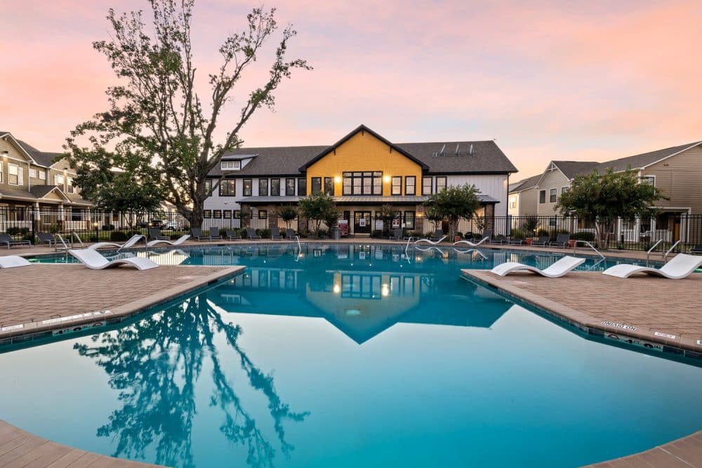 the collective at norman apartments near the university of oklahoma resort style pool sunset