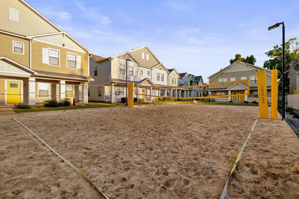 the collective at norman apartments near the university of oklahoma sand volleyball court
